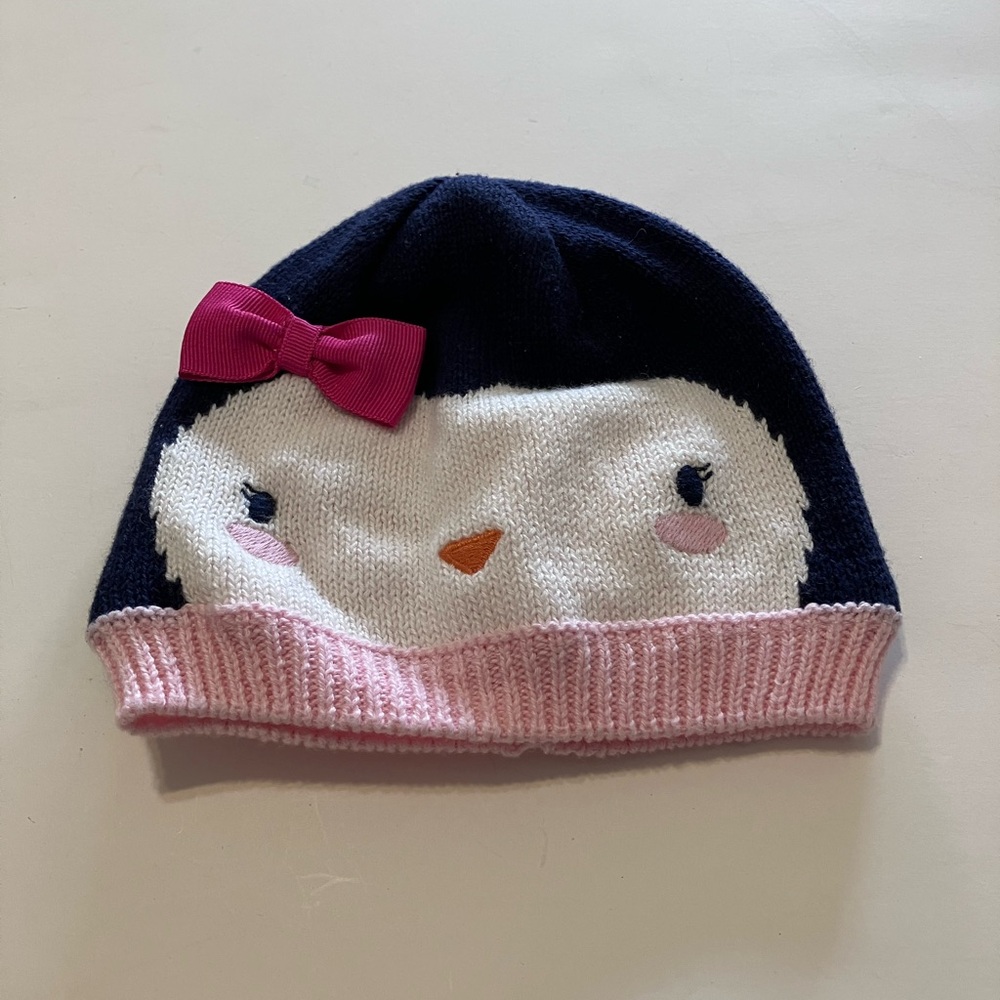 Cute Penguin Knit Hat with Pink Bow for newborns.